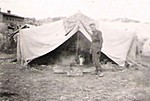 In front of tent In front of tent